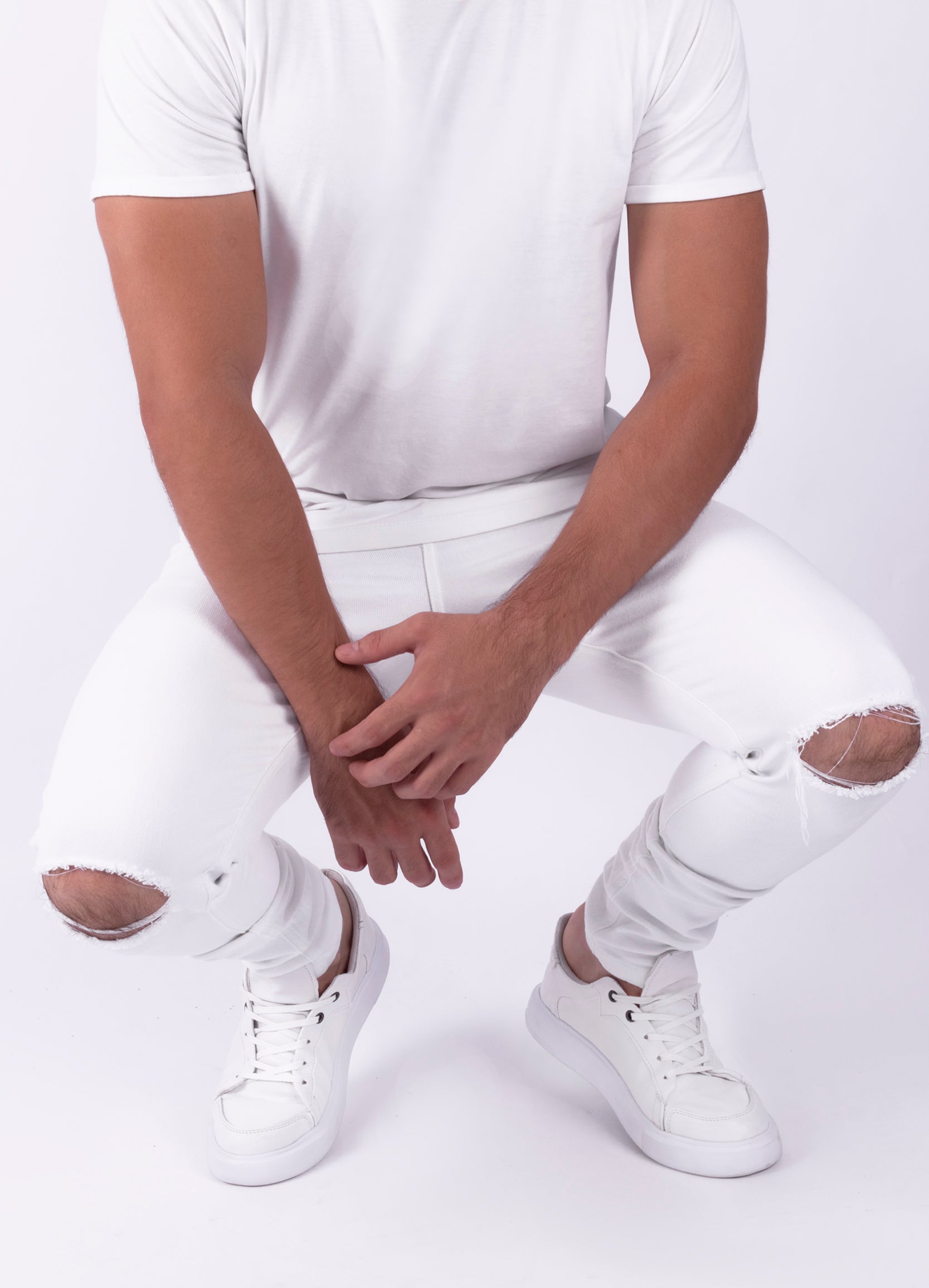 Pantalones blancos rotos online hombre