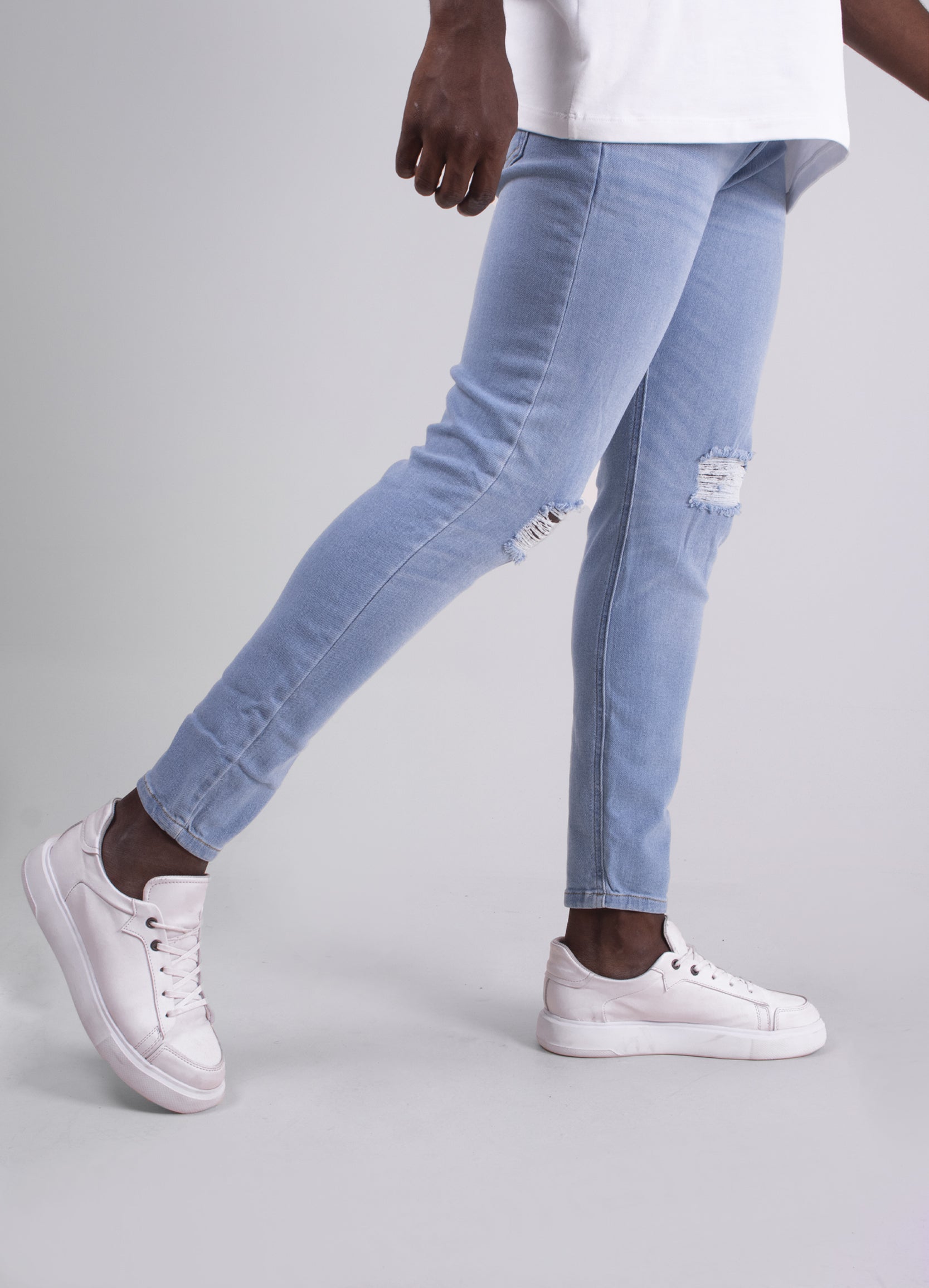 Jeans rotos en la rodilla online hombre